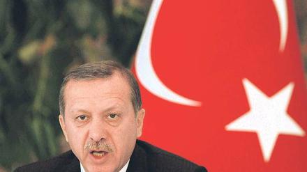 Warme Worte. Recep Tayyip Erdogan verlangt Verbundenheit mit dem Heimatland. Aber er fordert seine Landsleute im Ausland auch dazu auf, sich zu integrieren. Foto: Reuters