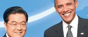 Freundlich im Ton. Der chinesische Präsident Hu Jintao und sein US-Kollege Barack Obama beim Nukleargipfel. Foto: dpa