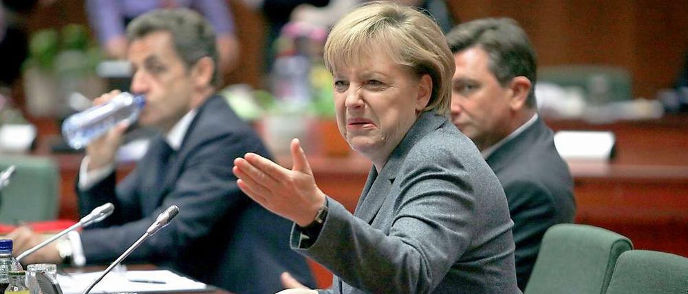Hart verhandelt. Bundeskanzlerin Angela Merkel fühlte sich nach dem EU-Gipfel am Donnerstag als Siegerin, im Hintergrund Frankreichs Präsident Nicolas Sarkozy.