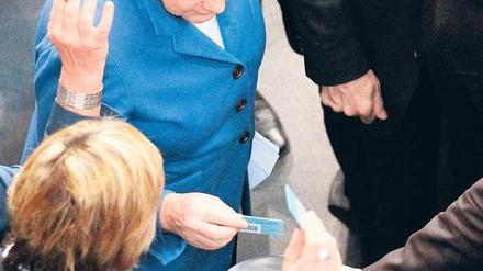 Eine Stimme unter vielen. Kanzlerin Angela Merkel am Mittwoch im Bundestag. Foto: dpa