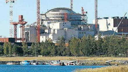 Atomkraftwerk mit Meerblick. Auf der Halbinsel Olkiluoto an der finnischen Westküste entsteht einer der modernsten Reaktoren der Welt. Foto: Bob Strong/Reuters