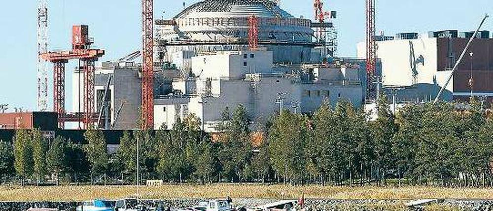 Atomkraftwerk mit Meerblick. Auf der Halbinsel Olkiluoto an der finnischen Westküste entsteht einer der modernsten Reaktoren der Welt. Foto: Bob Strong/Reuters