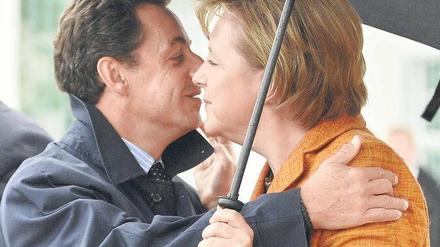 Für Angela Merkel und Nicolas Sarkozy (oben) ist der deutsch-französische Motor Europas kein Vergnügen.