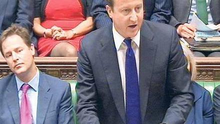Entschlossenheit versuchte David Cameron im Parlament zu demonstrieren. Die Opposition hielt sich mit Kritik zurück. Foto: dpa