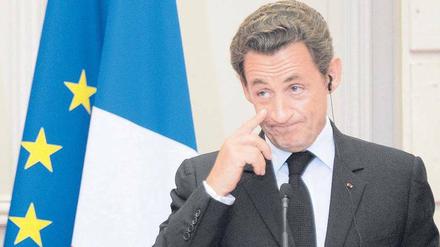 Mission Defizitabbau. Frankreichs Staatschef Sarkozy will zwölf Milliarden Euro einsparen. Foto: Horacio Villalobos/dpa