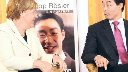 Chefin, Vize: Merkel und Rösler. 