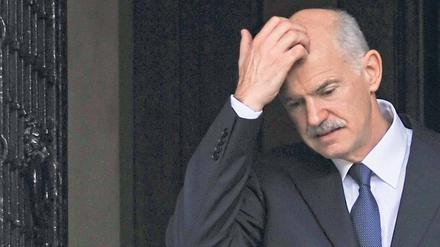 Vertrackte Lage. Giorgos Papandreou hat dieser Tage gesagt, er klebe nicht an seinem Stuhl. Trotzdem will er helfen, Probleme des Landes zu lösen. Foto: Louisa Gouliamaki / AFP
