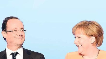 Auf Konfliktkurs. Frankreichs Präsident François Hollande will Euro-Bonds, Kanzlerin Angela Merkel lehnt sie kategorisch ab.