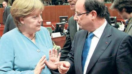 Auf der Suche nach einer gemeinsamen Arbeitsmethode. Kanzlerin Angela Merkel und Frankreichs Staatschef François Hollande sind beim Thema Euro-Bonds geteilter Meinung. 