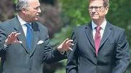 Im Garten der Villa Borsig in Berlin, wo Außenminister Guido Westerwelle (rechts) seinen französischen Amtskollegen Laurent Fabius zum Antrittsbesuch empfing, ging es um Syrien.