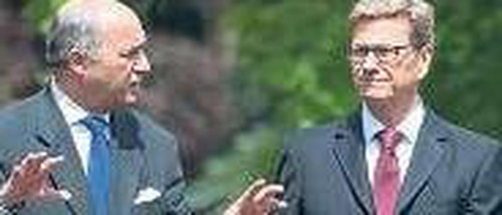 Im Garten der Villa Borsig in Berlin, wo Außenminister Guido Westerwelle (rechts) seinen französischen Amtskollegen Laurent Fabius zum Antrittsbesuch empfing, ging es um Syrien.