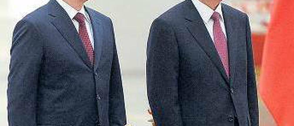 Präsidenten unter sich. Wladimir Putin und Hu Jintao in Peking. Foto: dpa