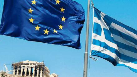 Teil der Gemeinschaft. Griechenland soll Mitglied der Euro-Zone bleiben – diese Versicherung erwartet Premierminister Samaras von Kanzlerin Merkel und Frankreichs Staatschef Hollande. 