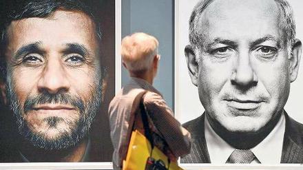 „Gesichter der Macht“, eine Ausstellung des griechischen Fotografen Platon Antoniou in der Photokina in Köln, zeigte 2012 einträchtig nebeneinander die Porträts des iranischen Präsidenten Ahmadinedschad (li.) und von Israels Premier Netanjahu. 