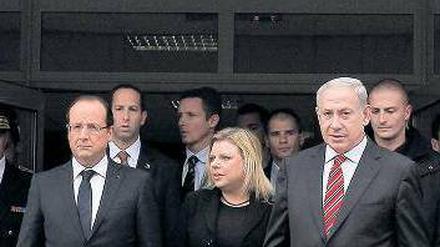 Am Tatort. Hollande (l.) und Netanjahu nach der Gedenkfeier in Toulouse.Foto: dpa