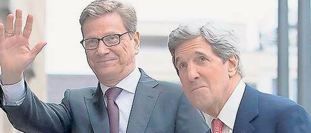 Rückkehr nach Berlin. US-Außenminister John Kerry, hier mit Guido Westerwelle, ist durch seine Kindheitserlebnisse in der geteilten Stadt geprägt worden.