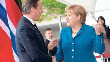 Bilaterale Begegnung. Merkel und Cameron 2012 vor dem Kanzleramt. Foto: dpa