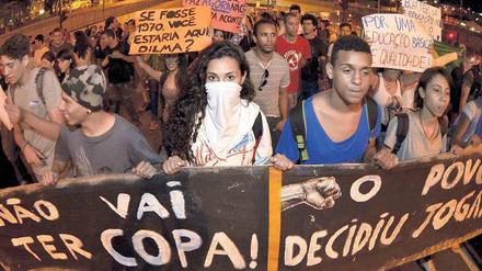 Wut der Jugend. Wie hier in Belo Horizonte protestieren im ganzen Land Zehntausende gegen soziale Missstände und die hohen Kosten der Fußball-WM. Foto: Douglas Magno/AFP