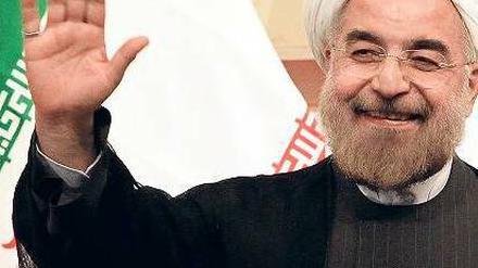 Lob aus Teheran. Irans Präsident Ruhani legt die Atomverhandlungen in die Hände seines Außenministers. Und lobt via Twitter: „Der erste Schritt ist der schwerste ...“ Foto: AFP