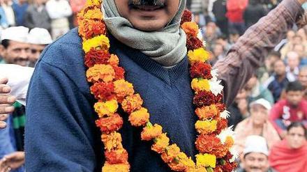Einer für alle. Arvind Kejriwal und seine Partei sind beliebt bei den kleinen Leuten. Dass sie es überhaupt an die Macht schafften, gilt als Überraschung. Foto: Sajjad Hussain/AFP
