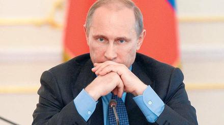 Getroffener Mann? Der russische Präsident Wladimir Putin – hier am Mittwoch im Kreml – reagiert bisher verhalten und belässt es bei Nadelstichen.