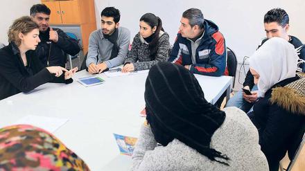 Deutschstunde. Syrische Flüchtlinge besuchen einen Integrationskurs.