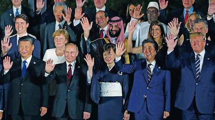 Winken allein reicht nicht. Gruppenbild der Regierungschefs beim G20-Gipfel im Juni in Osaka.