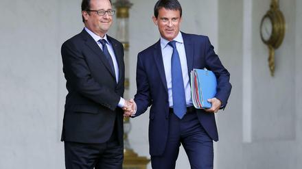 Staatschef Hollande (links) hat Premierminister Valls mit einer Regierungsumbildung beauftragt.