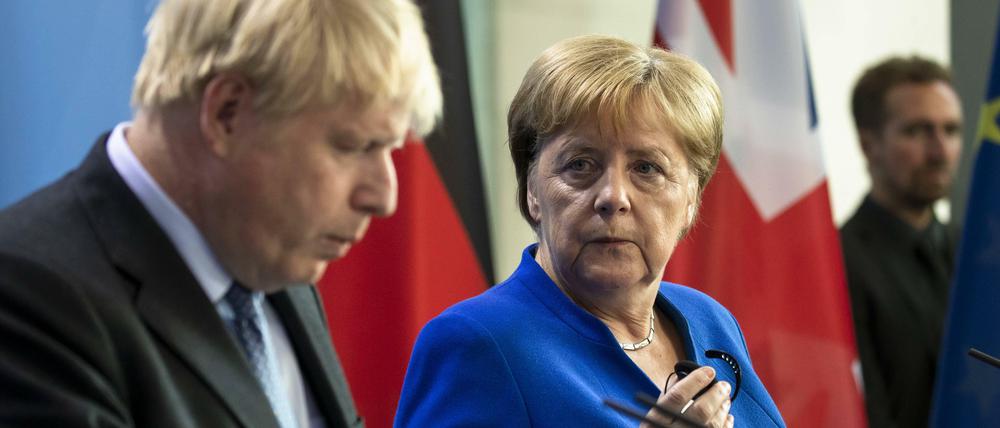 Bundeskanzlerin Angela Merkel ist kompromissbereit, der britische Premier Boris Johnson sieht keine Lösung.
