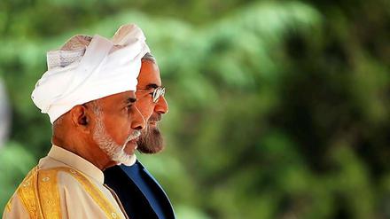 Omans Sultan Qabbous und Irans Präsident Hassan Ruhani. 