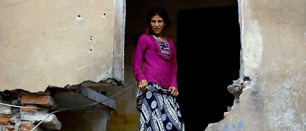 Eine junge Frau aus Syrien hat mit ihrer Familie Obdach in einer Ruine in Istanbul gefunden. 