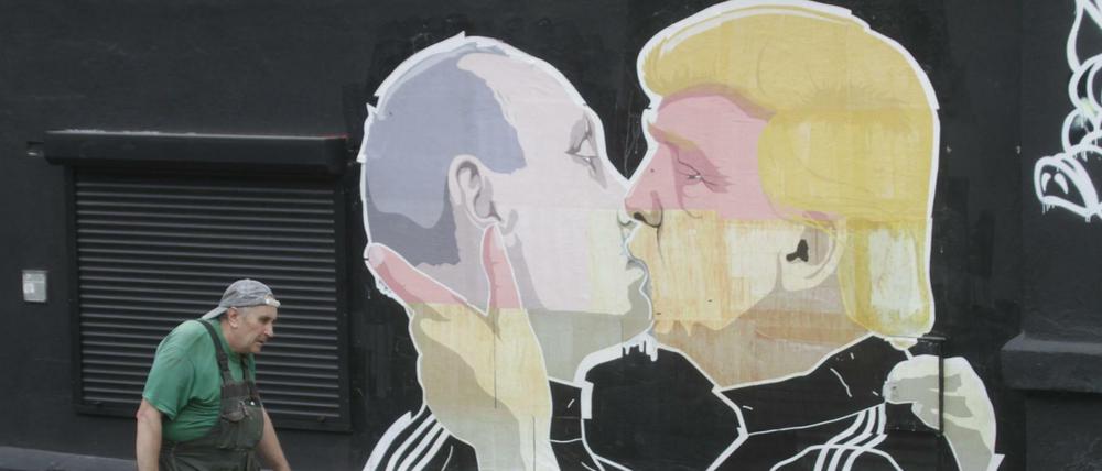 Ein Graffiti in Litauen zeigt Wladimir Putin und Donald Trump. 