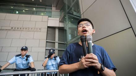 Aktivist Joshua Wong, hier bei einer Kundgebung in Hongkong. Er ist unterwegs nach Deutschland.