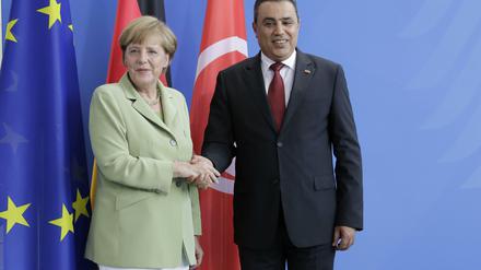 Die Kanzlerin und Tunesiens Premier