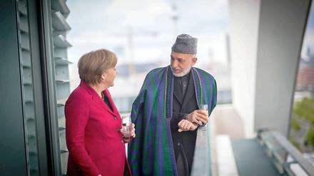 Bundeskanzlerin Angela Merkel (CDU) und der afghanische Präsident Hamid Karsai haben sich am Mittwoch in Berlin getroffen.