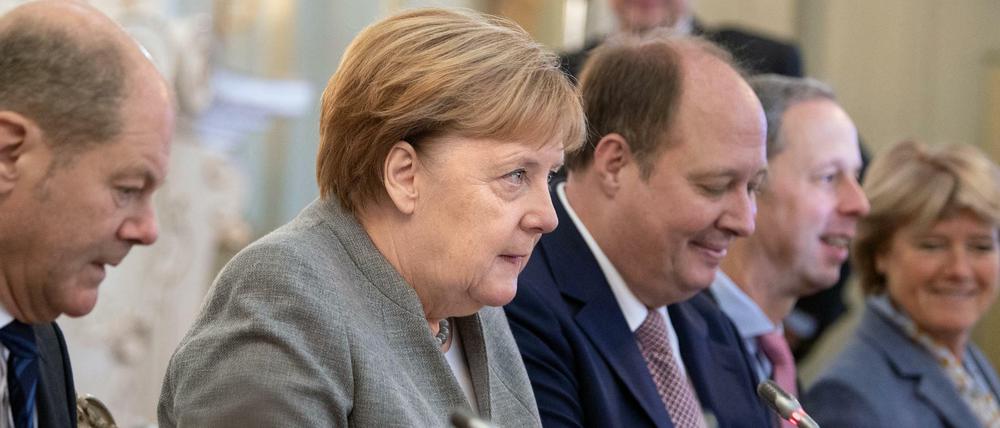 Schlechte Kassenlage: Finanzminister Olaf Scholz, Kanzlerin Angela Merkel und Kanzleramtschef Helge Braun