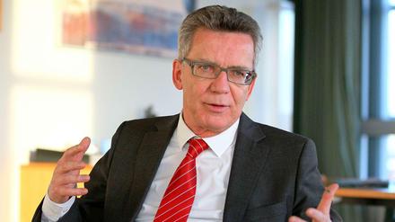 Bundesinnenminister Thomas de Maizière (CDU) stößt bei der SPD mit seinen Vorschlägen zur Neuregelung des Doppelpass auf Kritik.