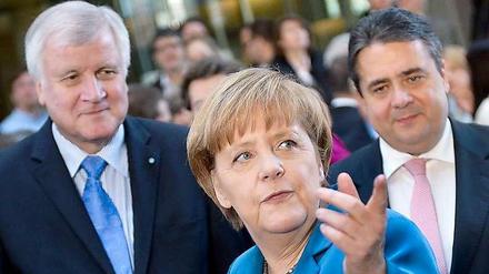 Die Parteichefs Angela Merkel (CDU), Horst Seehofer (CSU) und Sigmar Gabriel (SPD)