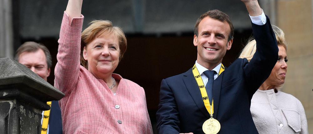Kanzlerin Merkel und Frankreichs Präsident Macron im vergangenen Mai in Aachen. 