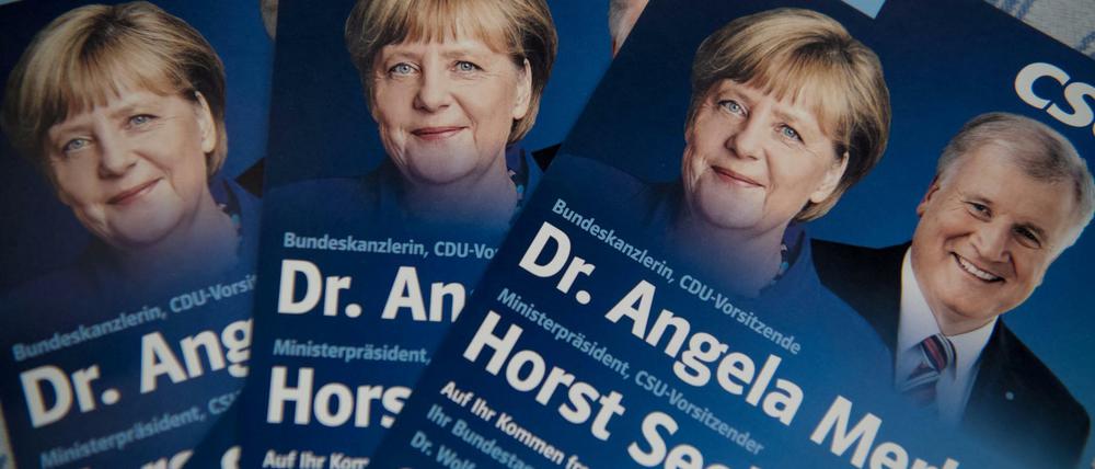 Flyer mit dem Bild von Bundeskanzlerin Merkel (CDU) und dem bayerischen Ministerpräsident Seehofer (CSU).
