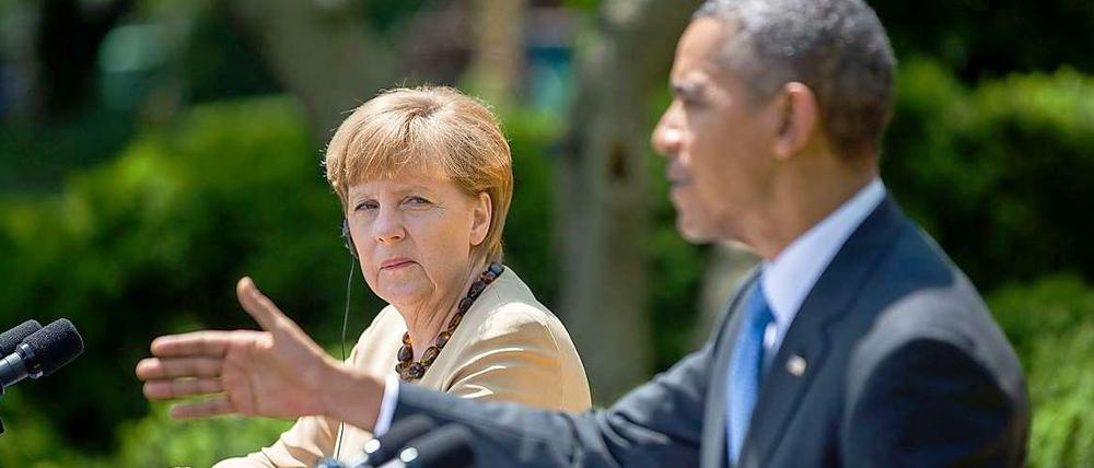 Transatlantische Einigkeit? Angela Merkel und Barack Obama bei der Pressekonferenz nach ihrem Gespräch im Weißen Haus. 