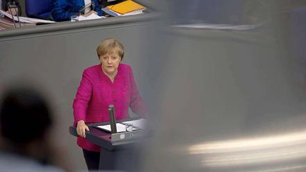 Die Atomkatastrophe in Fukushima habe sie umdenken lassen, sagte Kanzlerin Merkel im Bundestag.