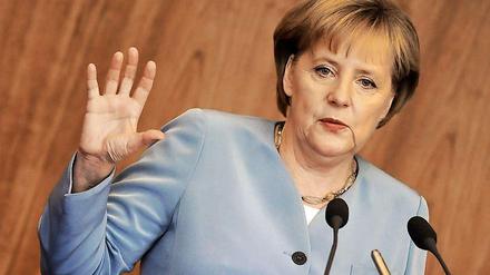 Auf einer rechten Internetseite wird Angela Merkel gedroht.
