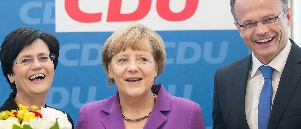 CDU-Chefin Angela Merkel eingerahmt von Christine Lieberknecht (Thüringen) und Michael Schierack (Brandenburg).