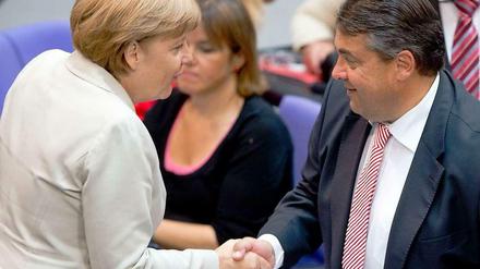 Kanzlerin Merkel und SPD-Chef Gabriel fangen erst an über eine große Koalition zu verhandeln. Schnell wird dies sicher nicht gehen.