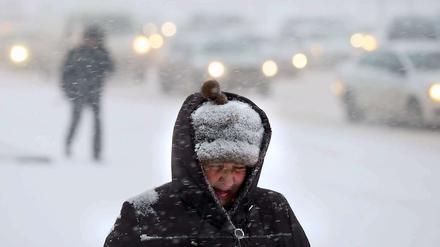 Ungemütlich ist es in Moskau durch einen heftigen Schneesturm.