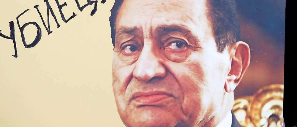 Für viele Ägypter ist er ein "Mörder", aber sofort will Präsident Mubarak die Macht nicht abgeben.