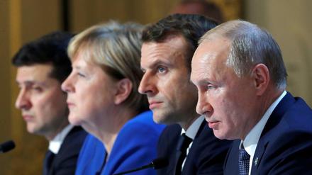 Fortschritte im Ukraine-Konflikt: Selenskyj, Merkel, Macron und Putin nach dem Gipfel in Paris