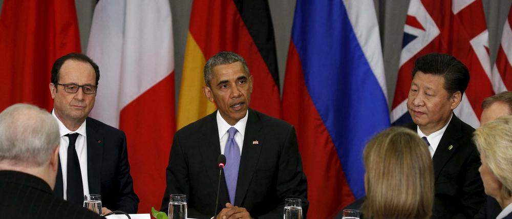 US-Präsident Barack Obama zwischen dem französischen Premier Hollande und dem chinesischen Präsidenten Xi. 