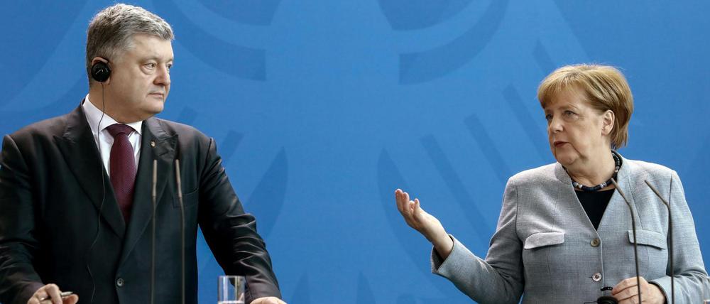 Bundeskanzlerin Angela Merkel und der ukrainische Präsident Petro Poroschenko.